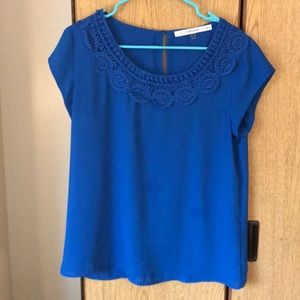 Lightweight and breezy embroidered color top